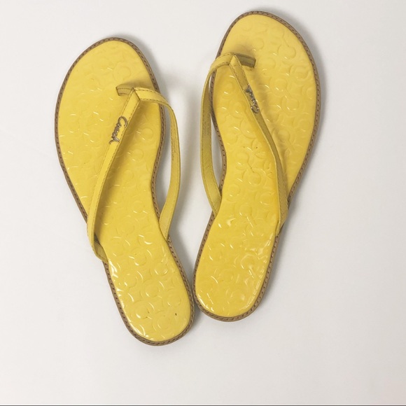 yellow coach flip flops